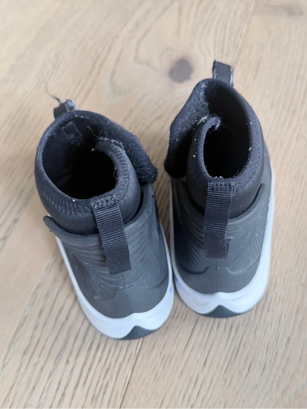 Kids Black Nike snow rain boot